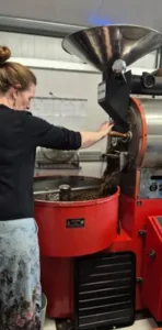 Grace finishing a coffee roast