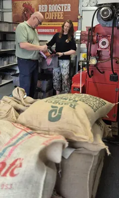 Paul and grace working out the next batch of fresh coffee from orders
