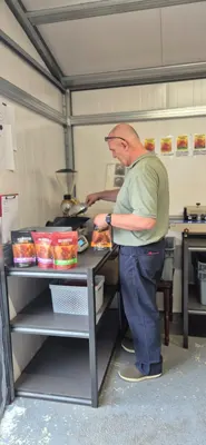 Paul weighing the coffee on the scales